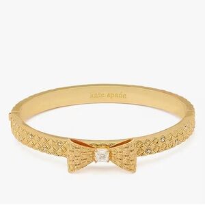 $135  KATE SPADE WRAPPED IN A BOW HINGED
BANGLE BRACELET